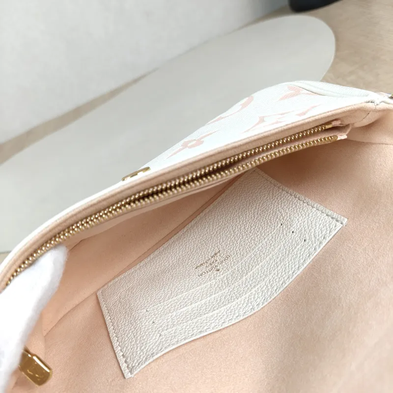 Louis Vuitton Crossbody Bag IVY White · Pink Empreinte Embossed Calfskin Small 23.5 × 4.3 × 12 cm — detail view 9 of 12