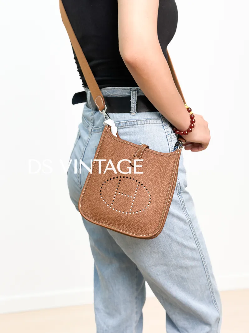 Hermès Crossbody Bag Evelyne Mini 16 Mini 16 Clemence Taurillon TC Calfskinmini17 × 5.5 × 18 cm — on-model view 2 of 3