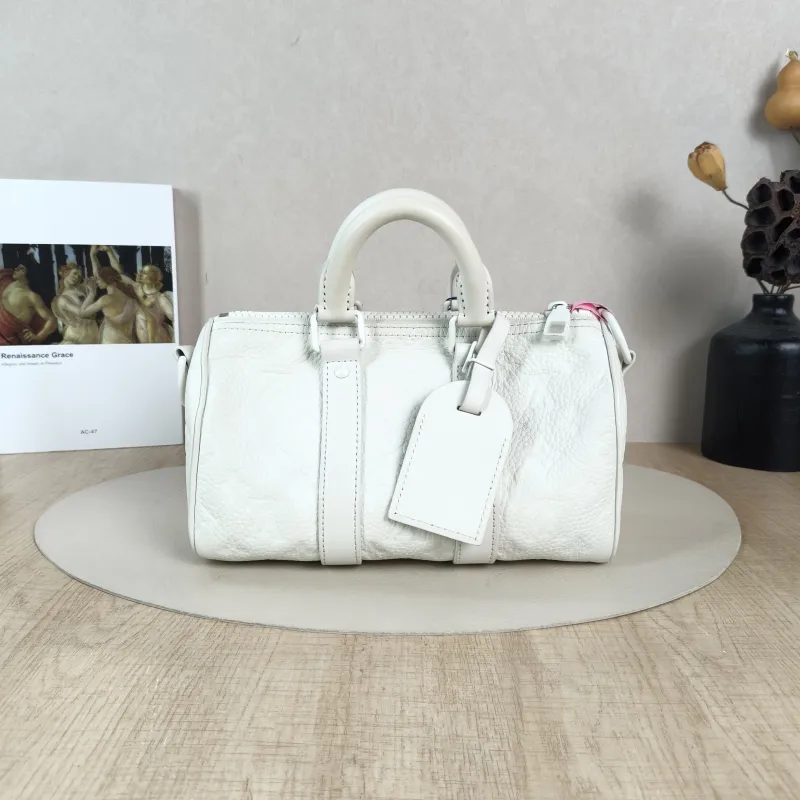 Louis Vuitton Crossbody Bag Keepall 25White Calfskin Medium25 × 11 × 15 cm