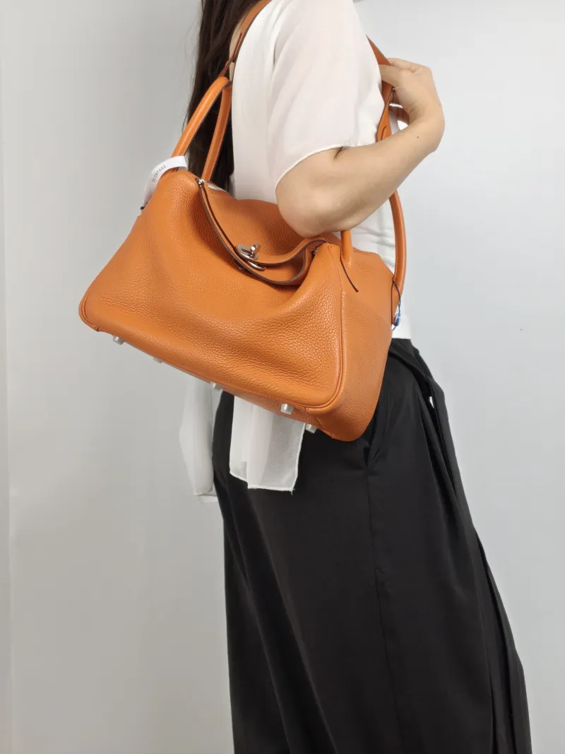 Hermès Crossbody Bag Lindy 30 Taurillon Clemence TC Calfskin 30 30 × 15 × 19 cm R — on-model view 1 of 2