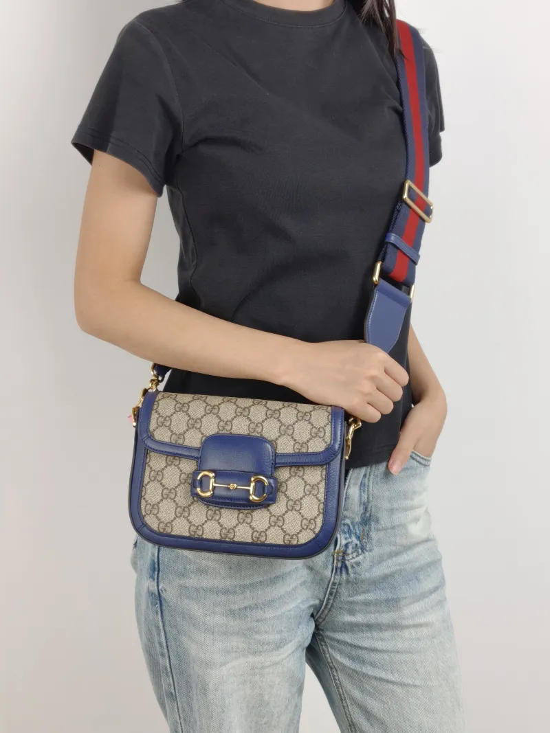 GUCCI Crossbody Bag Horsebit 1955 Horsebit Small Blue Monogram PVC Calfskin Small 20.5 × 5 × 14.5 cm — on-model view 1 of 2