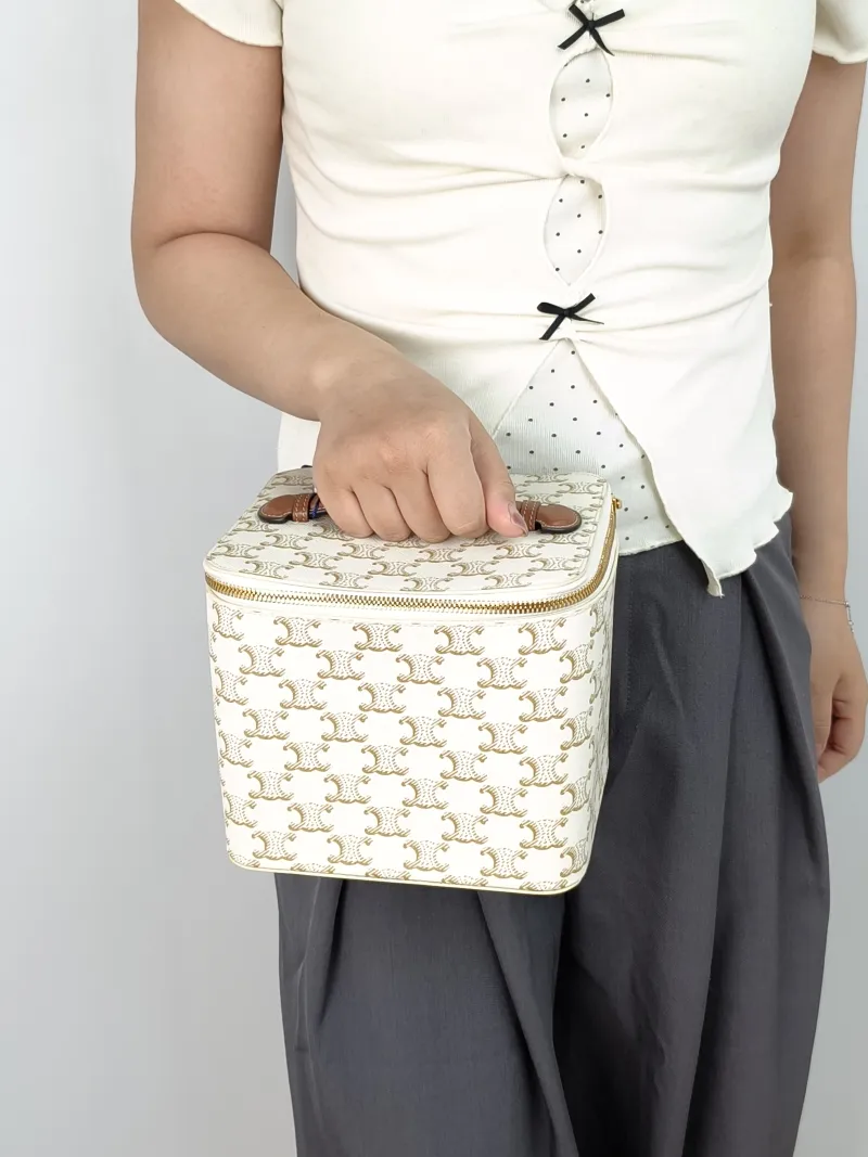 CELINE Cosmetic Bag White PVC One Size18 × 14.5 × 15 cm — on-model view 1 of 2