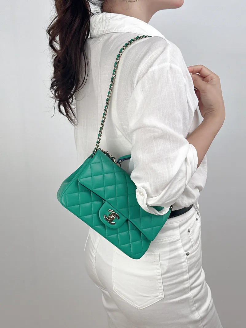 Chanel Crossbody Bag mini Green Lambskin mini20 × 6 × 12 cm — on-model view 1 of 3