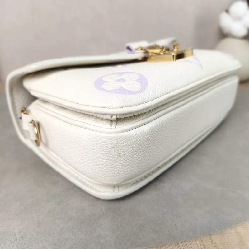 Louis Vuitton Crossbody Bag Pochette Métis East West White · Monogram Empreinte Embossed Calfskin Small 21.5 × 6 × 13.5 cm — detail view 5 of 14