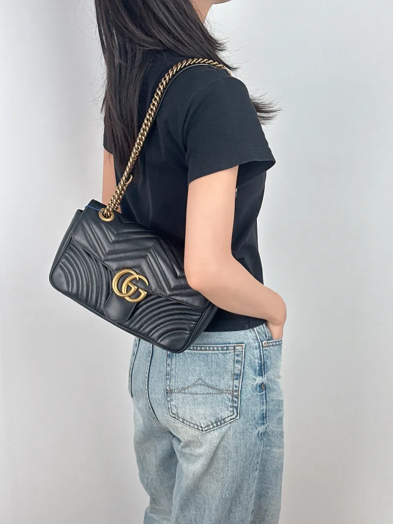 GUCCI Crossbody Bag GG Marmont Medium Marmont 26 Black CC alfskin Medium 26 × 7 × 15 cm — on-model view 1 of 2