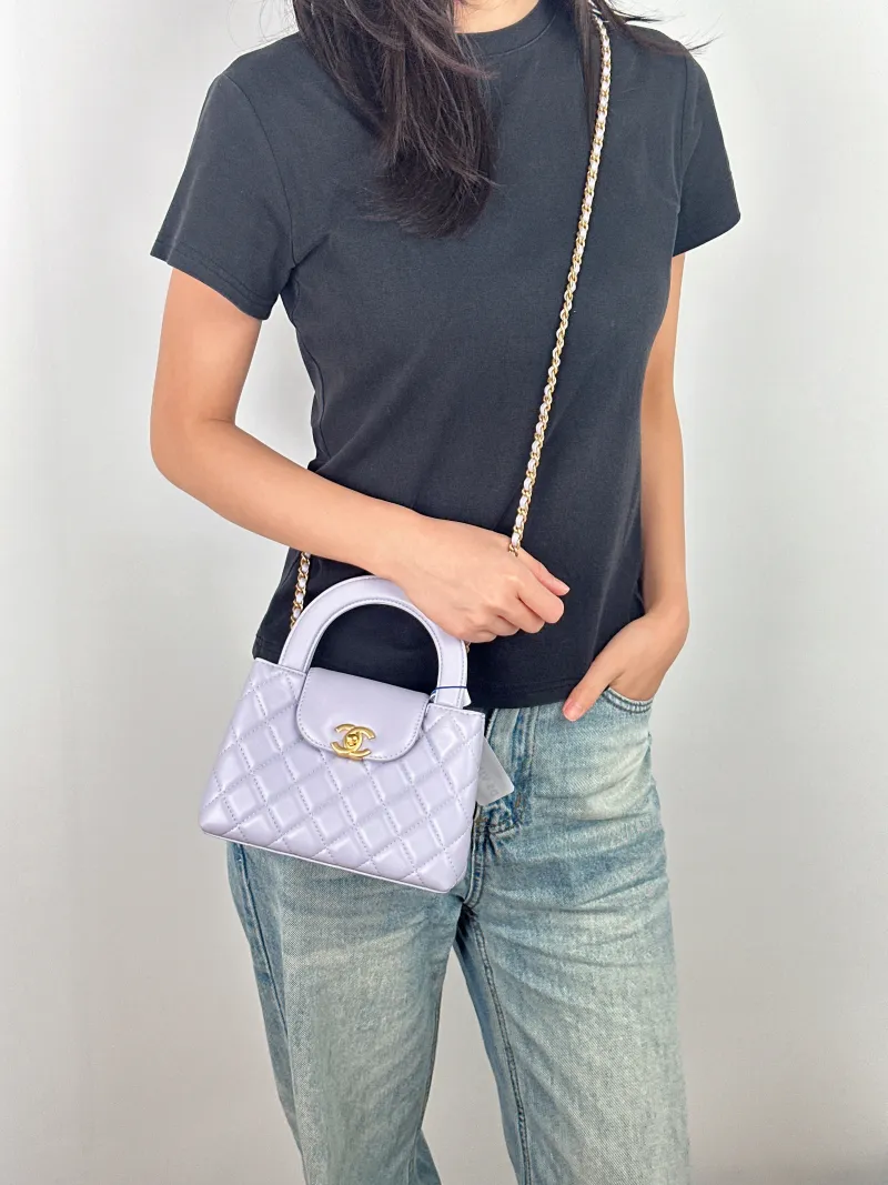 Chanel Crossbody Bag Kelly Lambskin Mini 19 × 7 × 13 cm — on-model view 3 of 3