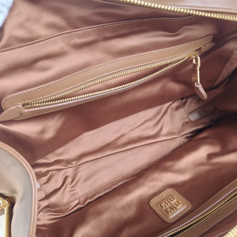 Miumiu Top Handle Bag Beau CC alfskin Large 34 × 10 × 23 cm — detail view 1 of 11