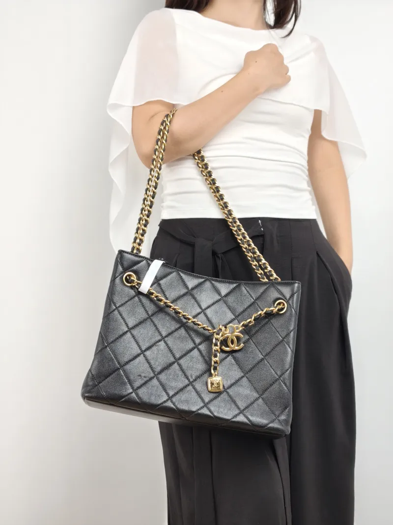 Chanel Shoulder Bag Tote Bag Black Lambskin One Size 30 × 10 × 23 cm — on-model view 1 of 2