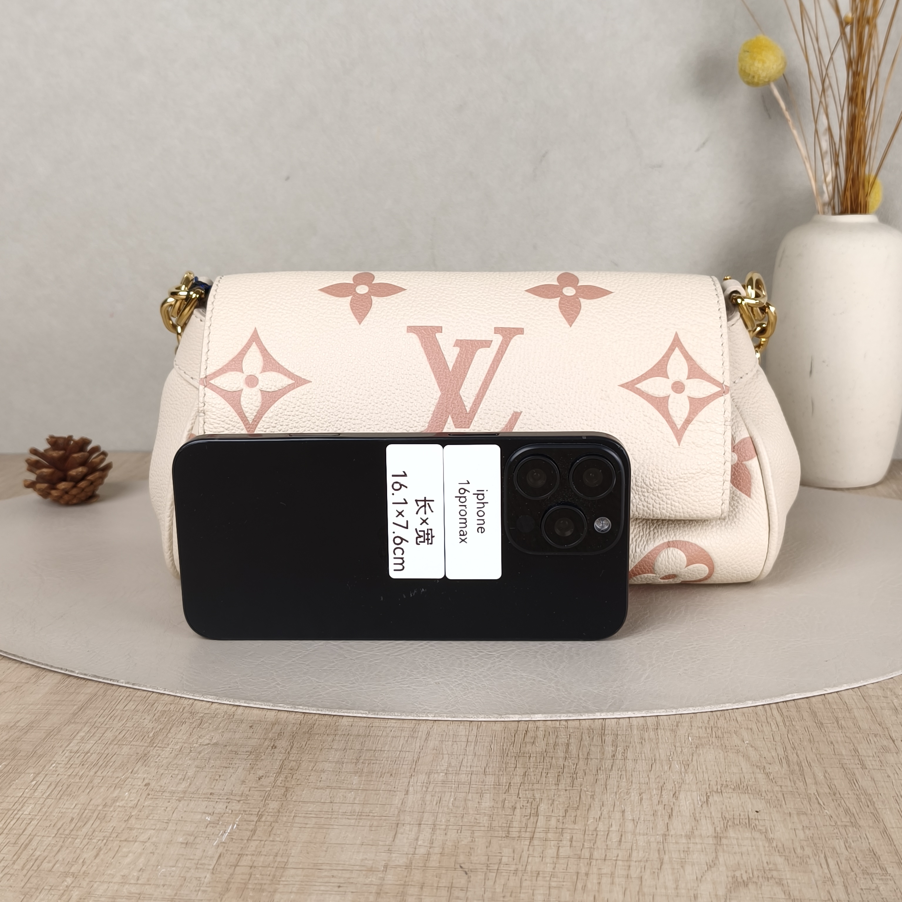 Louis Vuitton Crossbody Bag Favorite White · Pink Empreinte Embossed Calfskin Monogram Medium24 × 9 × 14 cm — cover view 3 of 6