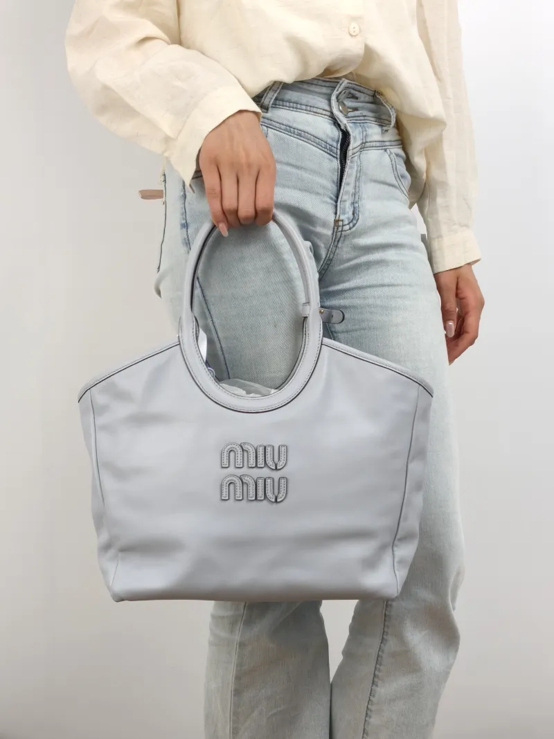 Miumiu Shoulder Bag IVY Tote Shopping Tote Blue Calfskin One Size 28 × 12.5 × 26 cm — on-model view 1 of 2