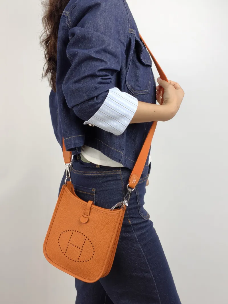Hermès Crossbody Bag Evelyne Mini 16 Mini 16 TC Calfskin Mini 17 × 5.5 × 18 cm G — on-model view 1 of 2