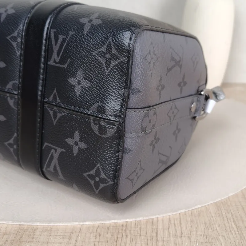 Louis Vuitton Crossbody Bag City Keepall Black PVC Medium 27 × 13 × 17 cm — detail view 9 of 12