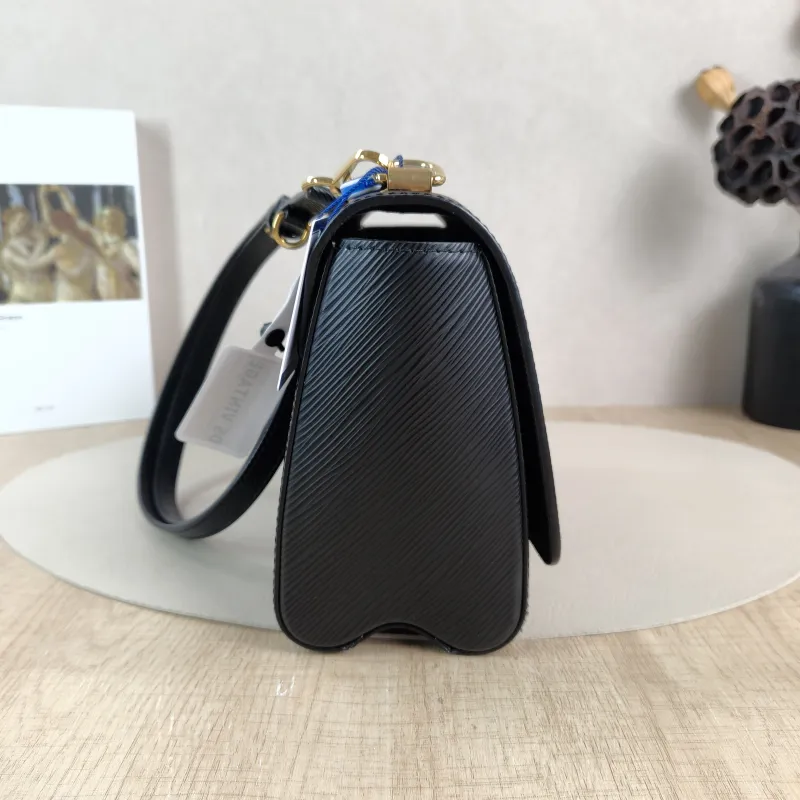 Louis Vuitton Crossbody Bag Twist Black Epi Embossed Calfskin Medium 23 × 9.5 × 17 cm — detail view 3 of 16