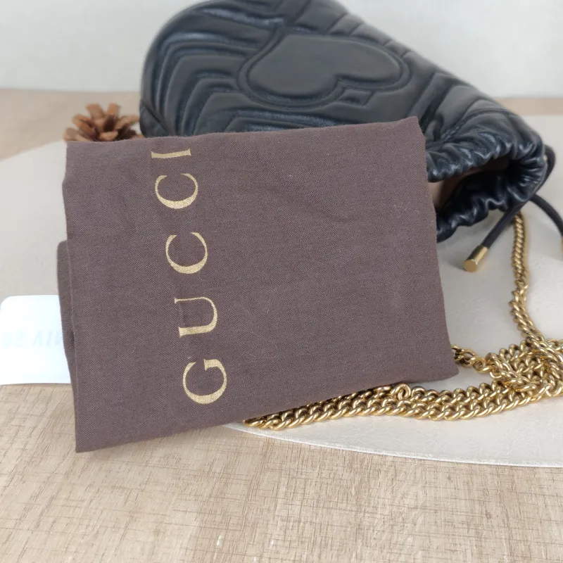 GUCCI Crossbody Bag GG Marmont Marmont Bucket Bag Black with Gold-Tone Hardware Calfskinmini13 × 10 × 17.5 cm — detail view 6 of 11