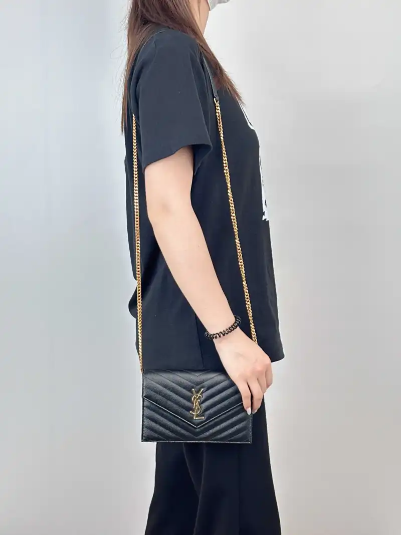SAINT LAURENT Crossbody Bag CASSANDRE ENVELOPE Black Calfskin One Size 19 × 3.5 × 12.5 cm — on-model view 3 of 3