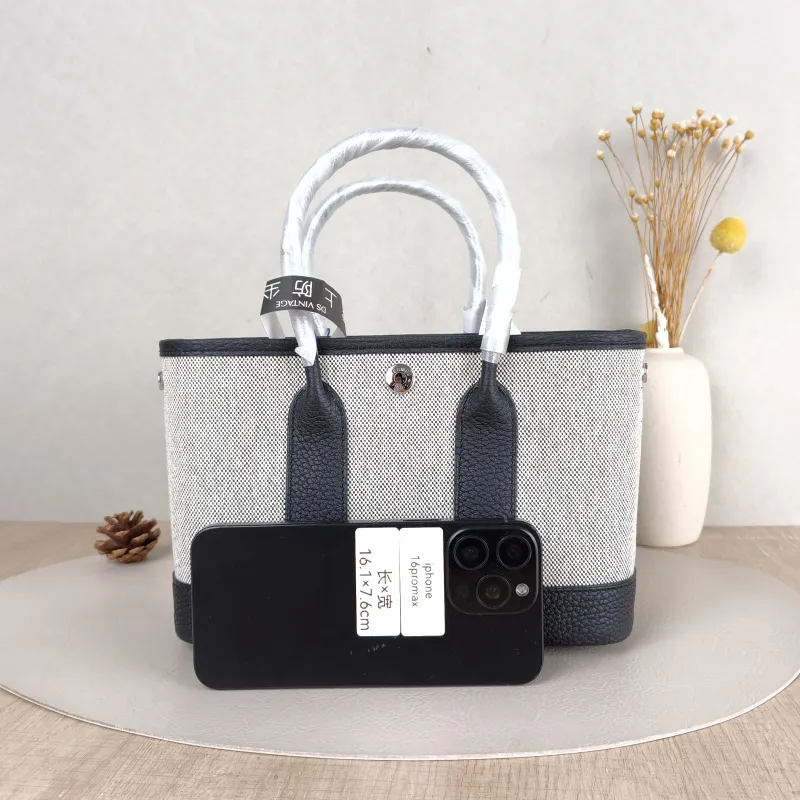Hermès Top Handle Bag Neo Garden 23 Mini Black · Beige Canvas · Negonda Calfskin Mini 23 × 10 × 16 cm G — cover view 4 of 6