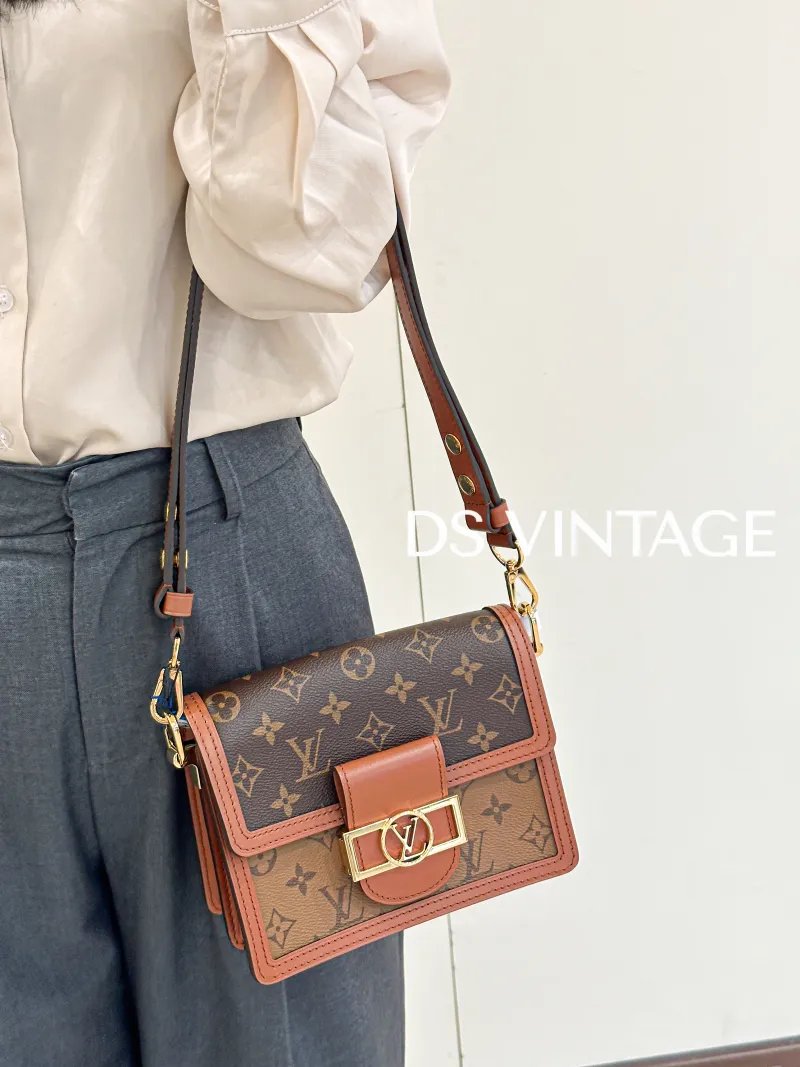 Louis Vuitton Crossbody Bag Dauphine Monogram PV Cmini20 × 9 × 15 cm — on-model view 3 of 3