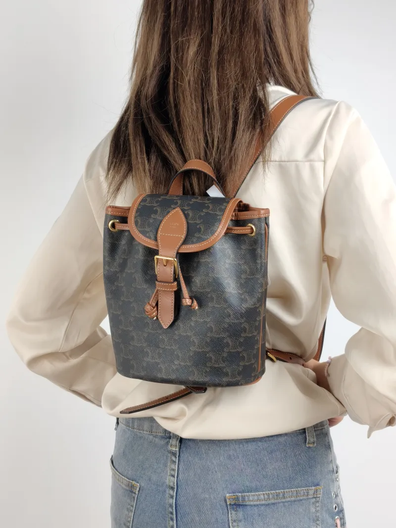 CELINE Backpack FOLCO Backpack Monogram PVC Mini 17 × 10 × 20 cm — on-model view 1 of 3
