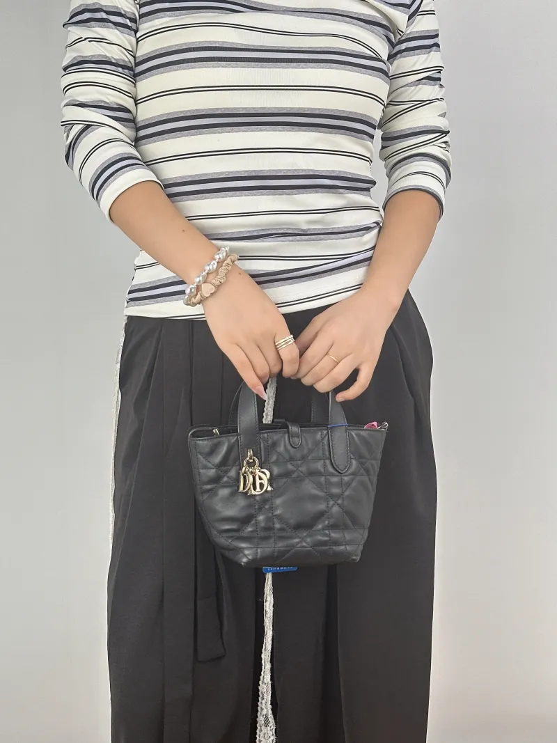 DIOR Top Handle Bag TOUJOURS Edition Black Calfskinmini13 × 12 × 15 cm — on-model view 2 of 2