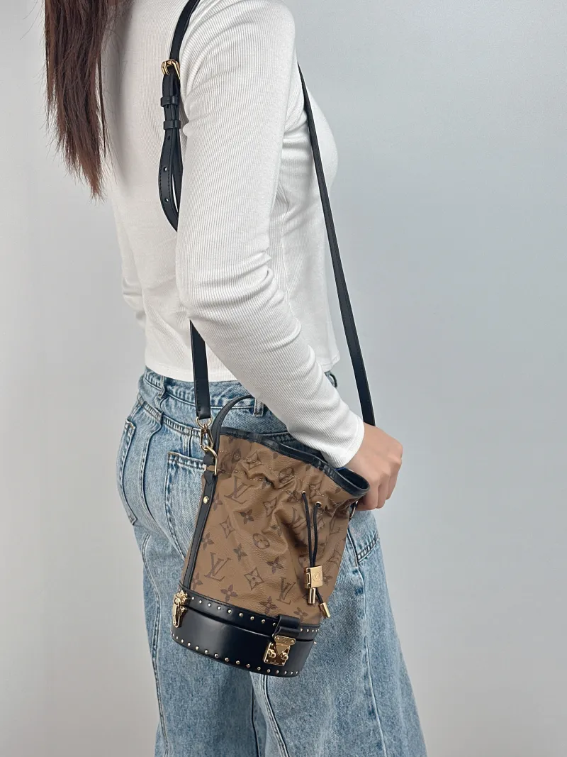 Louis Vuitton Shoulder Bag Petit Noe Edition Bucket Bag Monogram PVC One Size 13.5 × 13.5 × 22 cm — on-model view 2 of 3