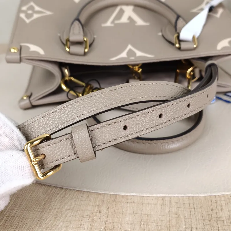 Louis Vuitton Shoulder Bag Onthego · White Monogram Empreinte Embossed Calfskin Small 25 × 11.5 × 19 cm — detail view 5 of 12