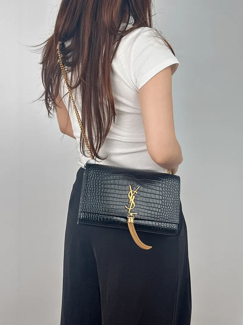 SAINT LAURENT Crossbody Bag KATE Edition Black Calfskin Medium 24 × 5.5 × 14.5 cm — on-model view 2 of 2