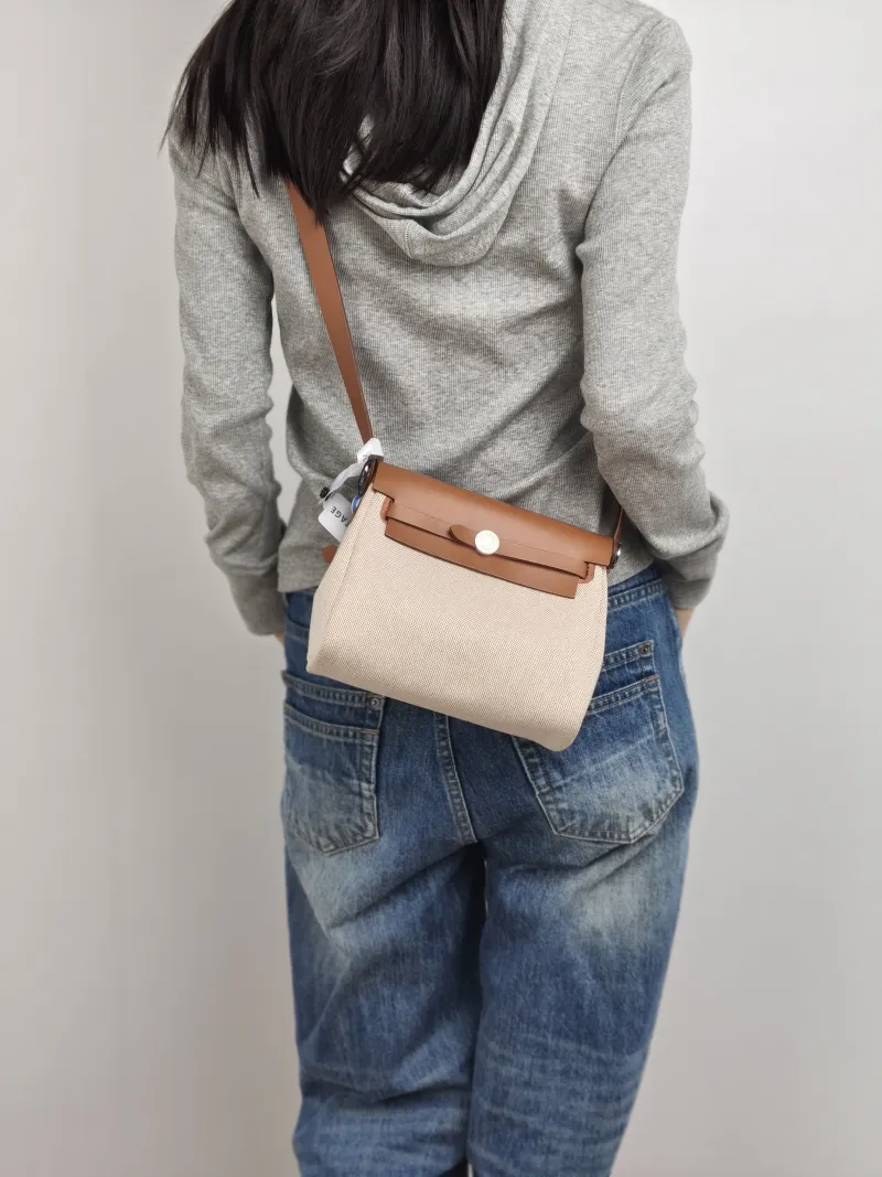 Hermès Shoulder Bag Herbag Zip 20 Berliner Canvas Canvas Mini 20 × 7 × 17 cm G — on-model view 1 of 3