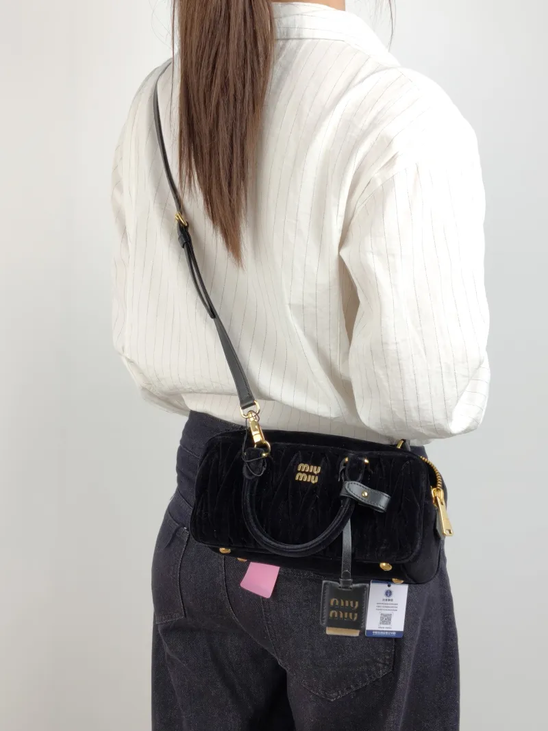 Miumiu Top Handle Bag Arcadie MatelasséCollection Edition Black Velvet Medium 23 × 7.5 × 11 cm — on-model view 1 of 2