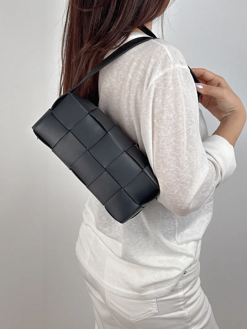 Bottega Veneta Shoulder Bag Brick Cassette Woven Black Lambskin Small 23.5 × 10 × 10 cm — on-model view 1 of 2