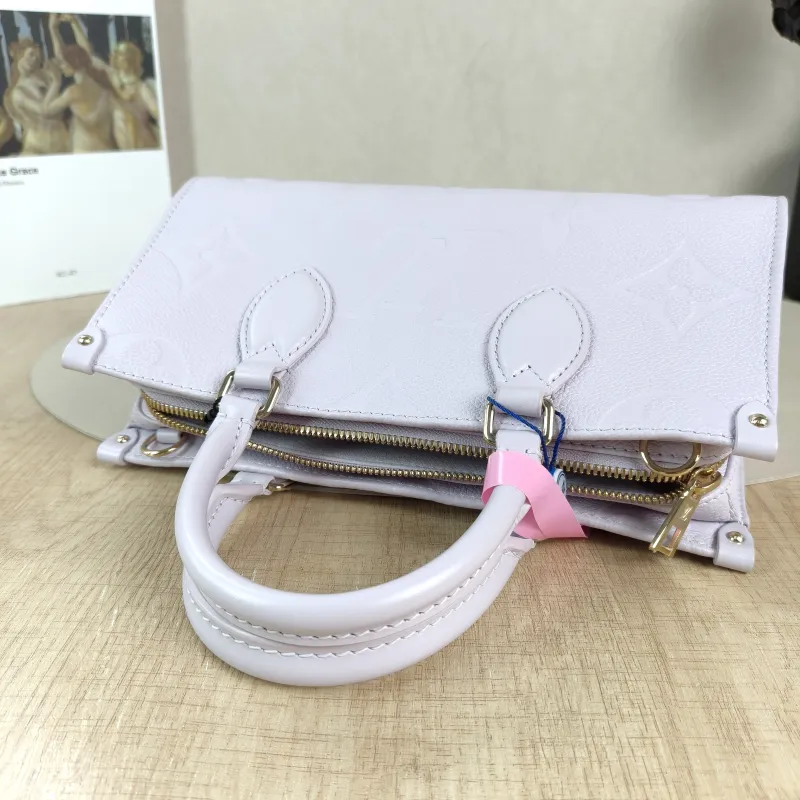Louis Vuitton Crossbody Bag Onthego East West Two Straps Empreinte Embossed Calfskin Small 25 × 10 × 13 cm — detail view 5 of 12
