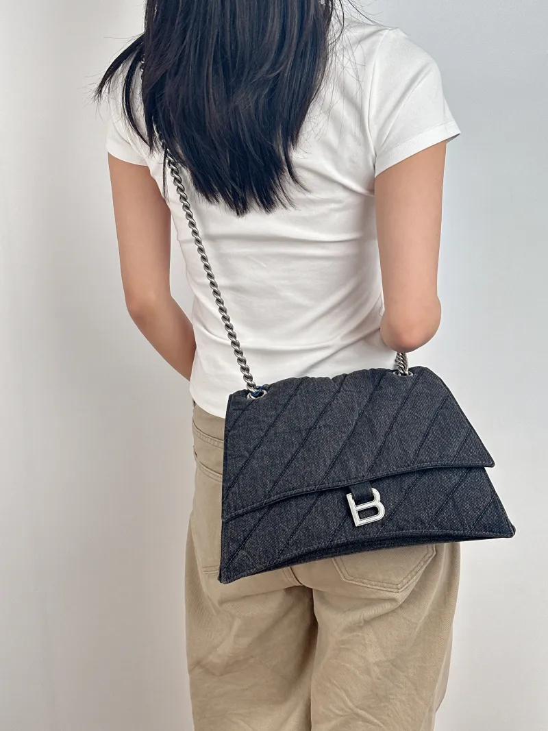 BALENCIAGA Shoulder Bag CRUSH Chain Bag Grey Medium 30 × 13 × 20 cm — on-model view 1 of 2