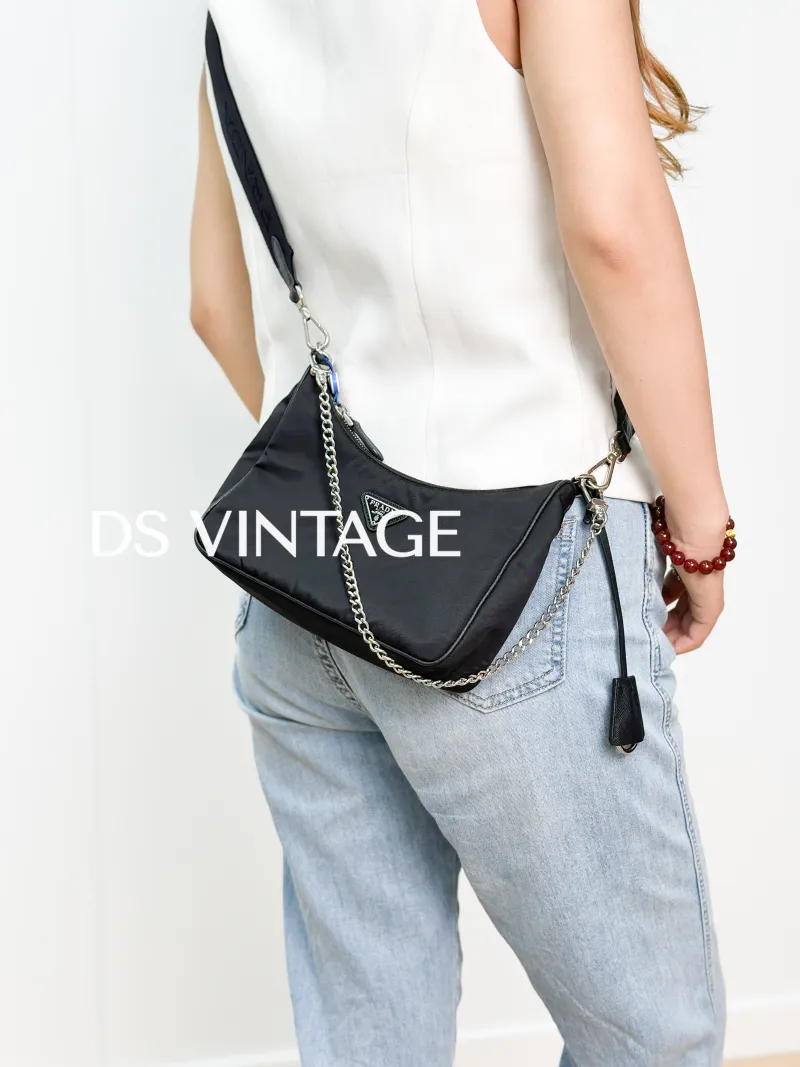 PRADA Crossbody Bag Re-Edition 2005 Hobo Black Nylon Mini 22 × 6 × 18 cm — on-model view 3 of 3