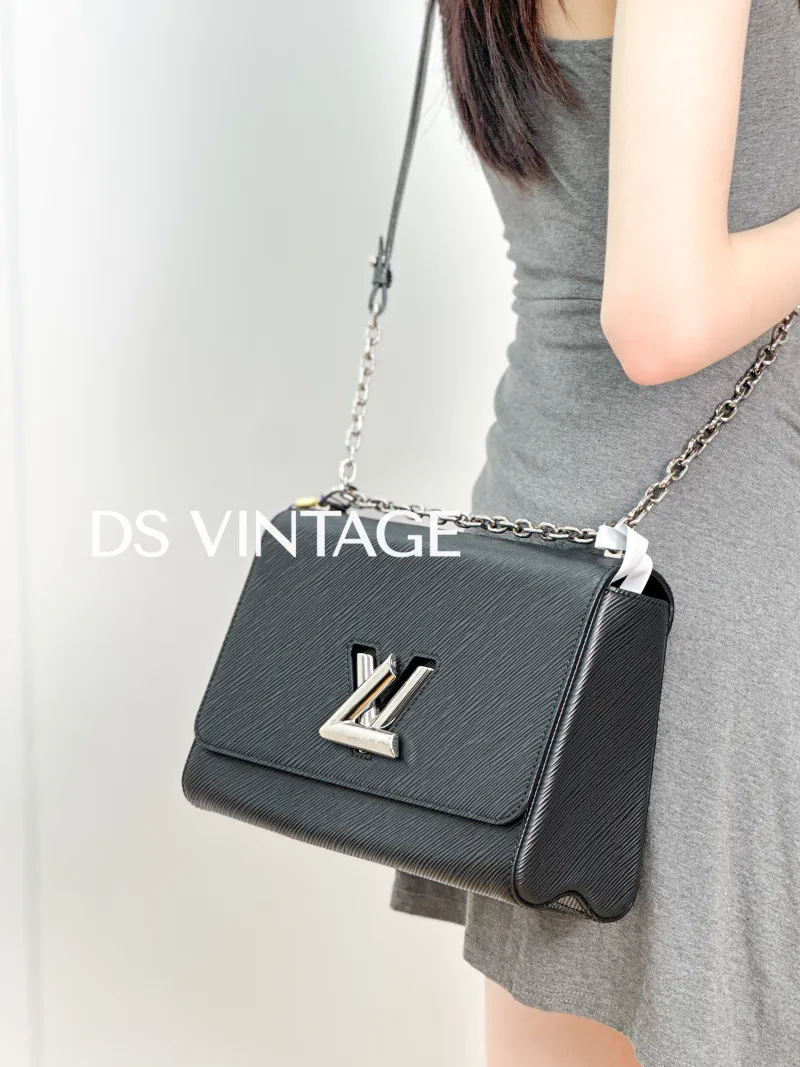 Louis Vuitton Crossbody Bag Twist Black Epi Embossed Calfskin Medium 23 × 9.5 × 17 cm — on-model view 3 of 3
