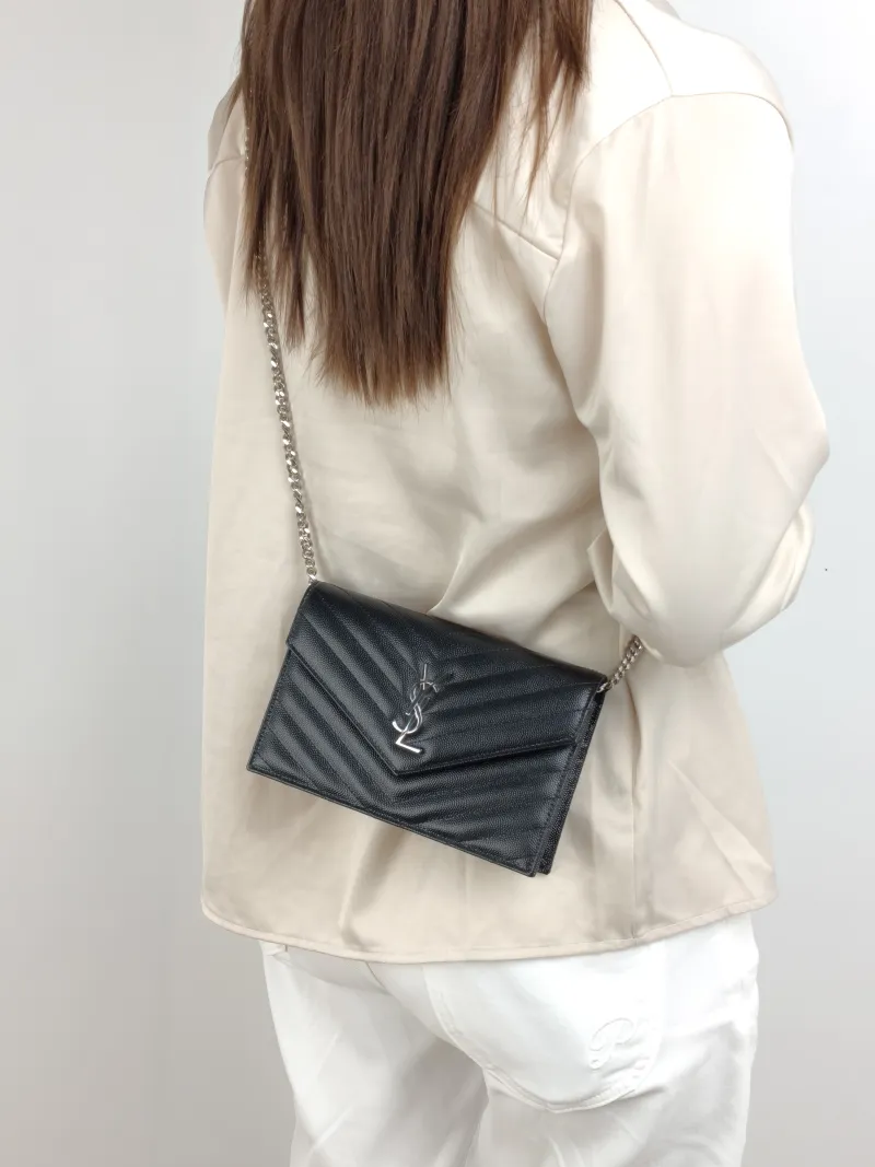 SAINT LAURENT Crossbody Bag CASSANDRE ENVELOPE Black Calfskin One Size 19 × 3.5 × 12.5 cm — on-model view 1 of 2