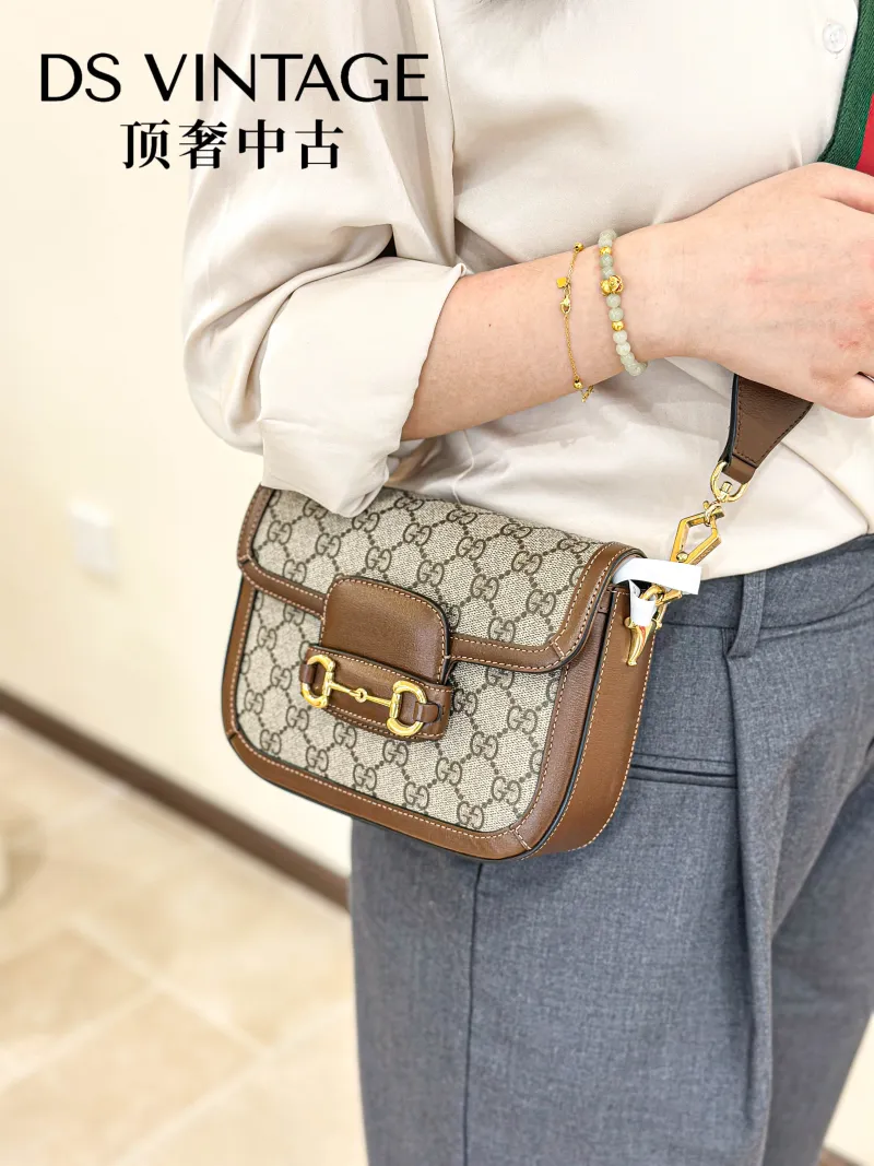 GUCCI Crossbody Bag Horsebit 1955 Horsebit Small Monogram PVC Small20.5 × 5 × 14.5 cm — on-model view 1 of 3