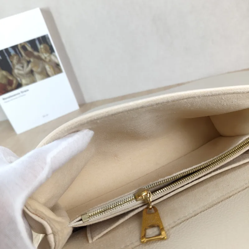 Louis Vuitton Crossbody Bag MADELEINE Beige Monogram Empreinte Embossed Calfskin BB 24 × 8.5 × 17 cm — detail view 11 of 12