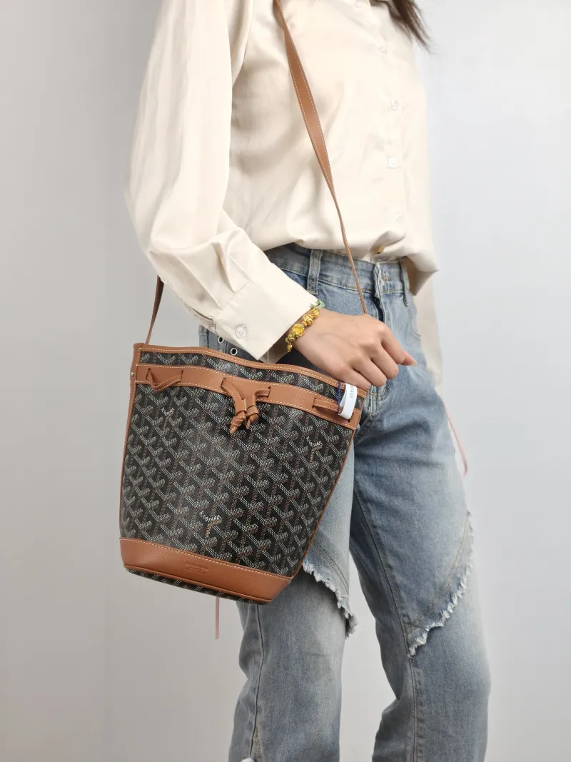 GOYARD Crossbody Bag Petit Flot Brown PVC Small 17 × 14.5 × 23 cm — on-model view 1 of 2