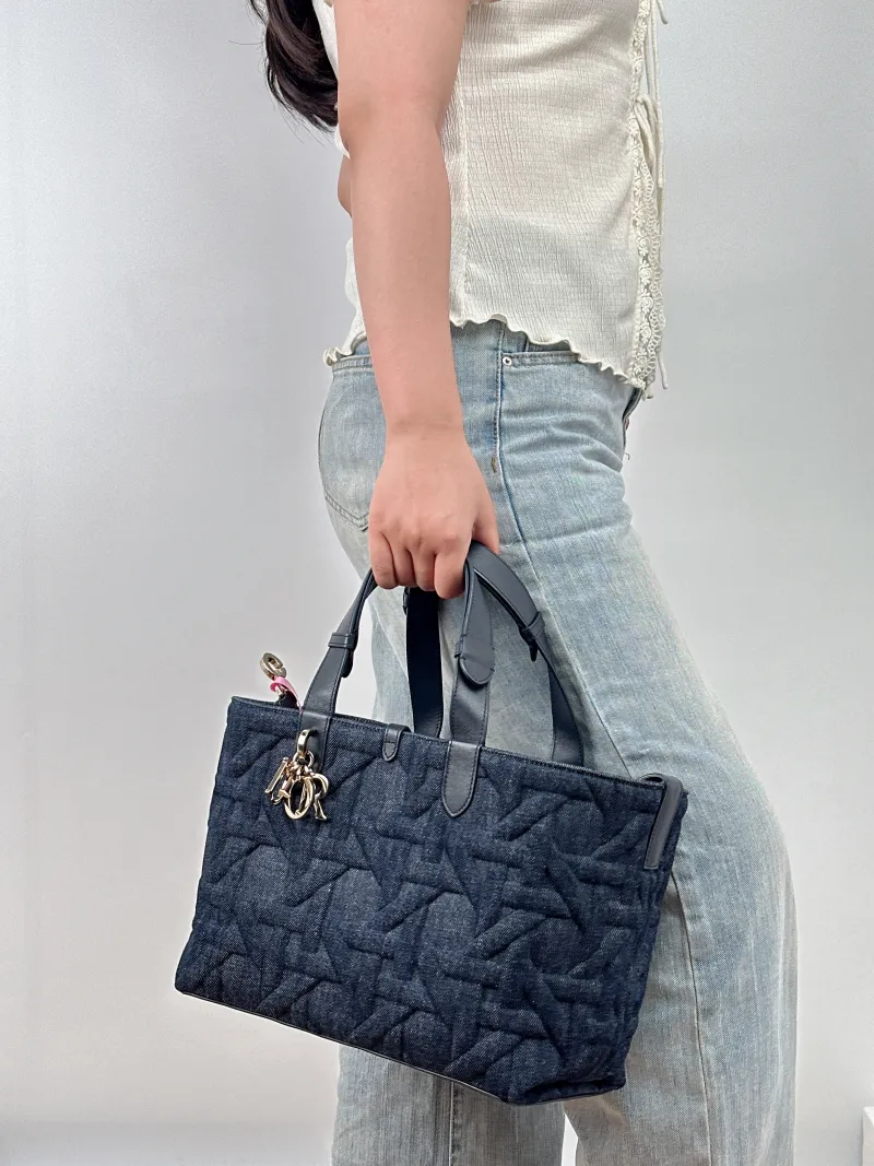 DIOR Top Handle Bag TOUJOURS Navy Medium 28.5 × 17 × 21.5 cm — on-model view 2 of 2
