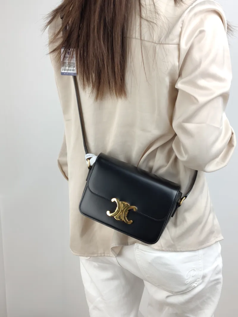 CELINE Crossbody Bag Teen Triomphe Black CC alfskin Small 18.5 × 6 × 14 cm — on-model view 1 of 2