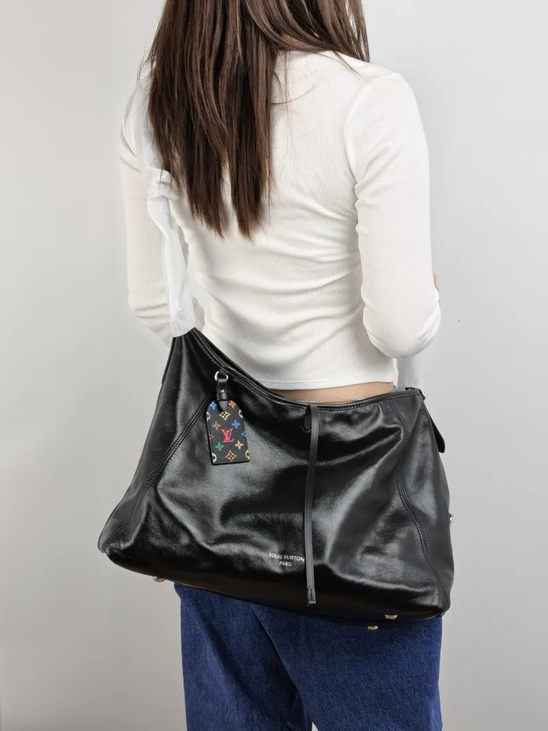 Louis Vuitton Crossbody Bag Carryall Vibe Black · Multicolore SL ambskin Medium 39 × 15 × 30 cm — on-model view 1 of 2