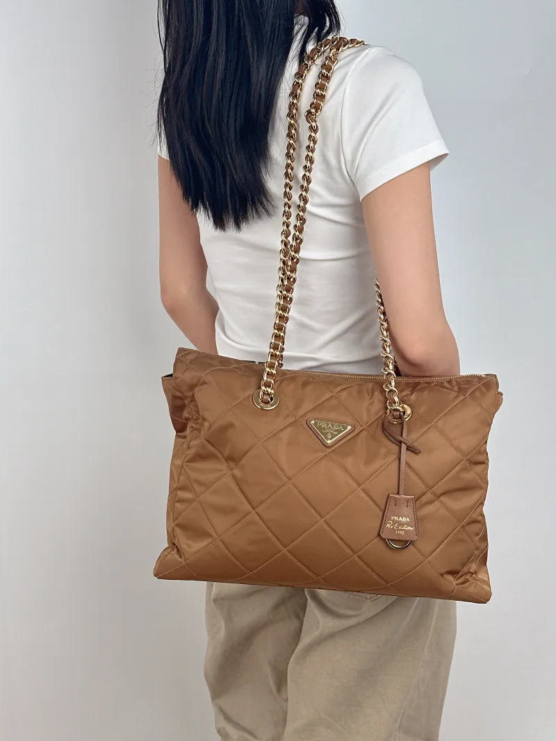 PRADA Shoulder Bag Re-Edition 1995 Brown Nylon One Size 36 × 11 × 25 cm — on-model view 1 of 2