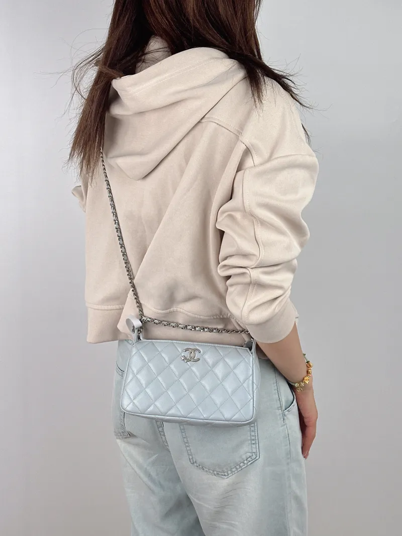 Chanel Crossbody Bag Blue Grained Calfskin 21 × 5.5 × 12 cm — on-model view 1 of 2