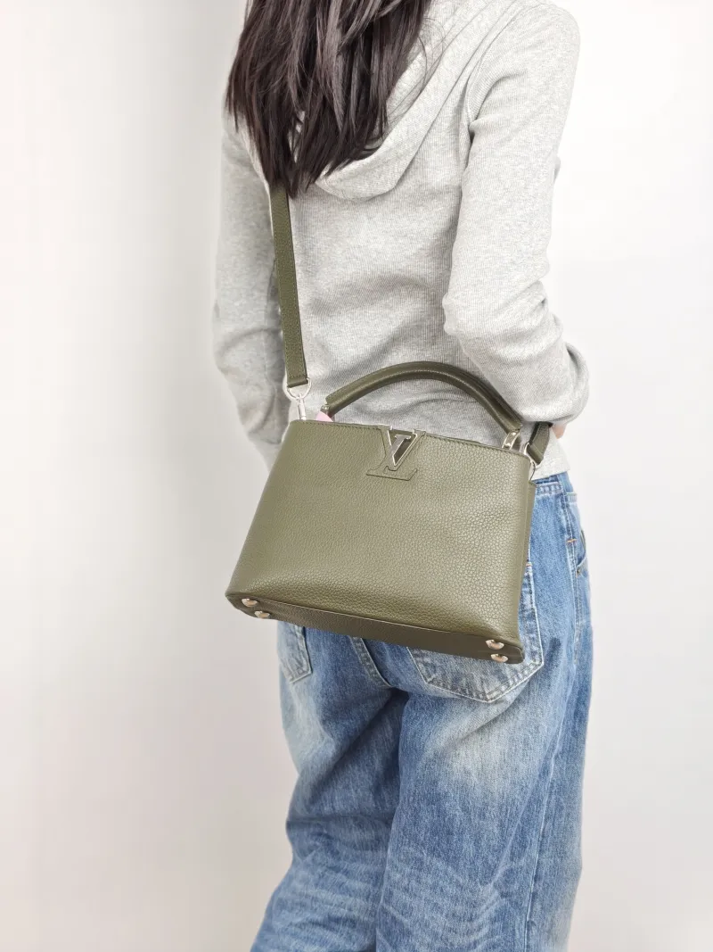 Louis Vuitton Top Handle Bag Capucines Calfskin BB 27 × 9 × 17.5 cm — on-model view 3 of 3