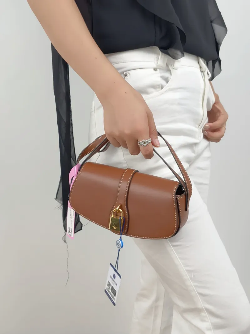 CELINE Crossbody Bag TABOU Brown Calfskinmini18 × 5 × 8 cm — on-model view 2 of 2