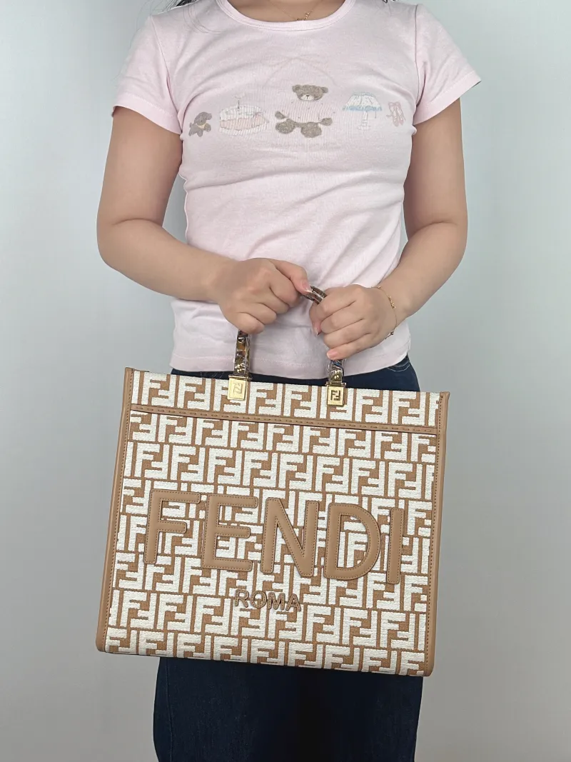 FENDI Top Handle Bag Sunshine Shopping Tote Medium 35 × 17 × 31 cm — on-model view 1 of 2