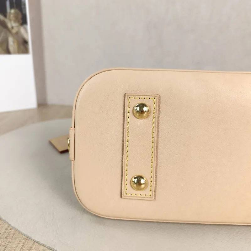 Louis Vuitton Top Handle Bag Alma BB Pink BB 23.5 × 11.5 × 17.5 cm — detail view 10 of 11