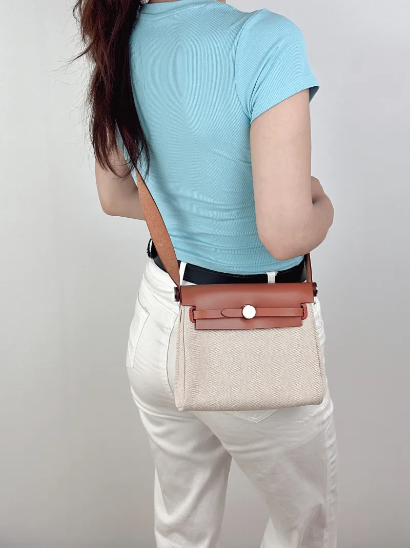 Hermès Shoulder Bag Herbag Zip 20 Beige Canvas mini20 × 7 × 17 cm — on-model view 2 of 2