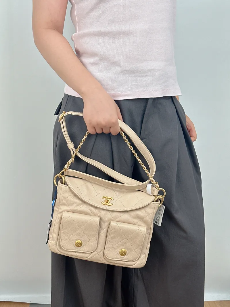 Chanel Shoulder Bag Supple Twins Hobo Beige Grained Calfskin Small 24.5 × 5 × 19 cm — on-model view 2 of 2