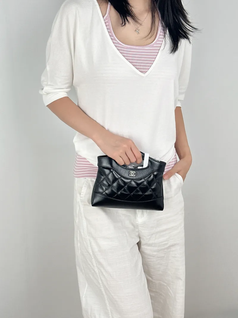 Chanel Crossbody Bag31Bag Black Waxed Leathernano20.5 × 3.5 × 17 cm — on-model view 3 of 3