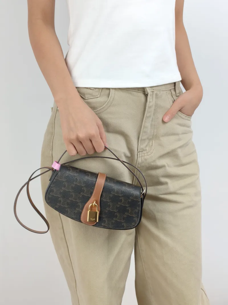 CELINE Crossbody Bag TABOU Monogram PVC Mini 18 × 5 × 8 cm — on-model view 1 of 2